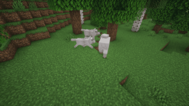 Perros y oveja en el bosque
